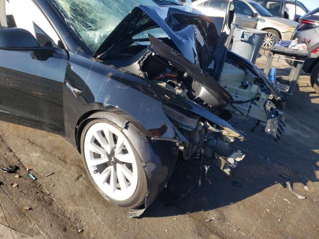 Photo 9 from auction – 2022 TESLA MODEL 3 with VIN 5YJ3E1EAXNF289208