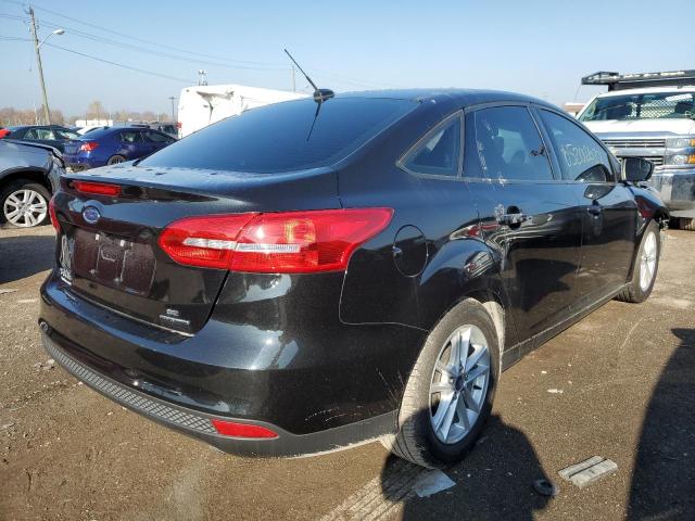 Photo 4 from auction – 2015 FORD FOCUS SE with VIN 1FADP3F24FL274385