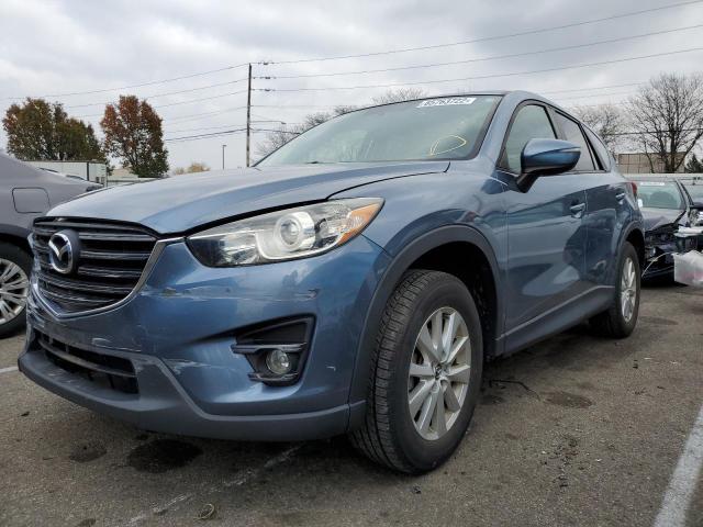Photo 2 from auction – 2016 MAZDA CX-5 TOURI with VIN JM3KE4CYXG0846074