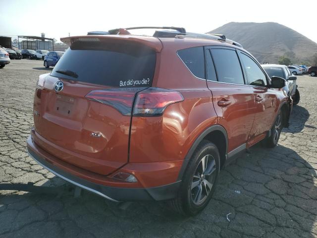Photo 4 from auction – 2016 TOYOTA RAV4 XLE with VIN JTMWFREV9GJ096667