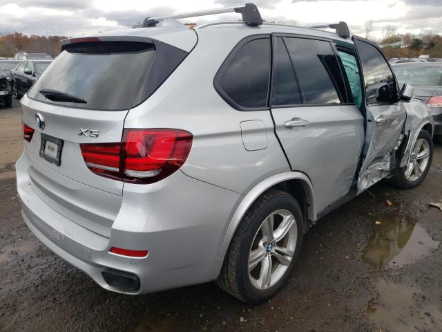 Photo 4 from auction – 2017 BMW X5 XDRIVE5 with VIN 5UXKR6C56H0J84542