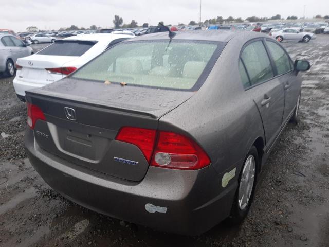 Photo 4 from auction – 2006 HONDA CIVIC HYBR with VIN JHMFA36206S006717