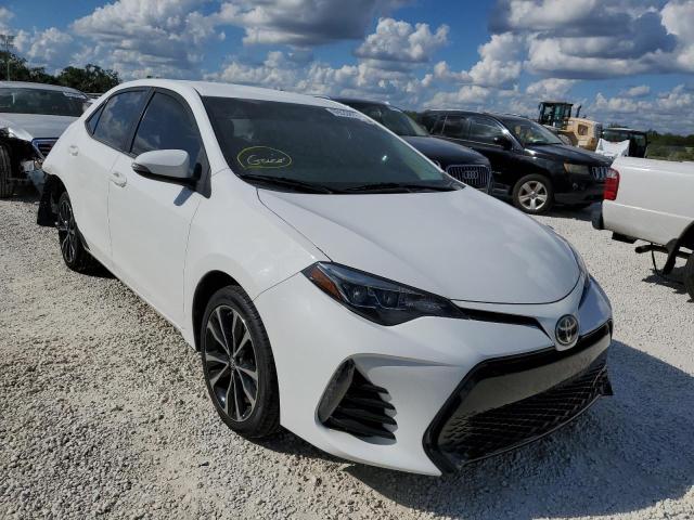TOYOTA COROLLA L 2018 with VIN 5YFBURHE9JP810719 - Photo from auction