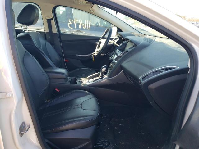 Photo 5 from auction – 2014 FORD FOCUS TITA with VIN 1FADP3N22EL220101