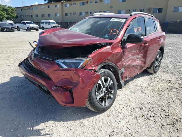 Photo 2 from auction – 2018 TOYOTA RAV4 LE with VIN JTMZFREVXJD112832