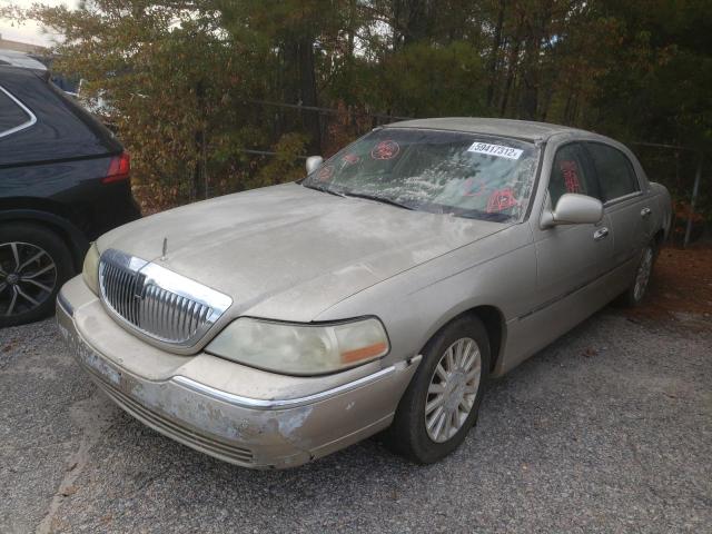 Photo 2 from auction – 2004 LINCOLN TOWN CAR E with VIN 1LNHM81WX4Y659621