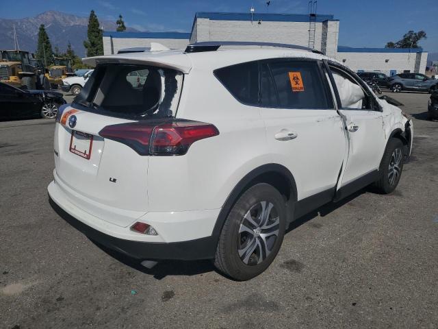 Photo 4 from auction – 2016 TOYOTA RAV4 LE with VIN JTMZFREV2GJ095681