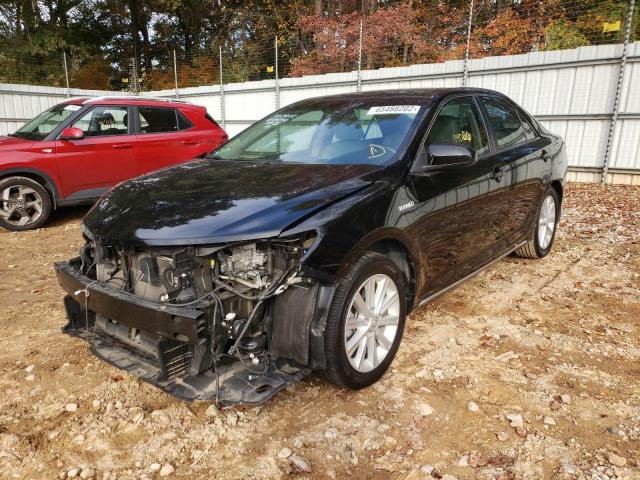 Photo 2 from auction – 2012 TOYOTA CAMRY HYBR with VIN 4T1BD1FK2CU034896
