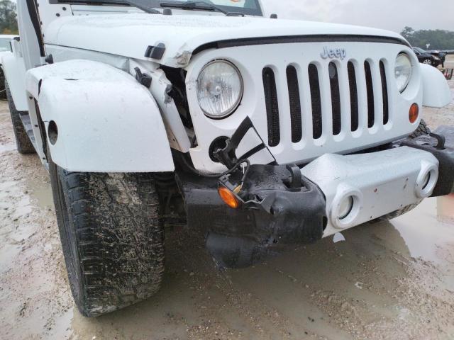 Photo 9 from auction – 2011 JEEP WRANGLER U with VIN 1J4BA5H13BL558209