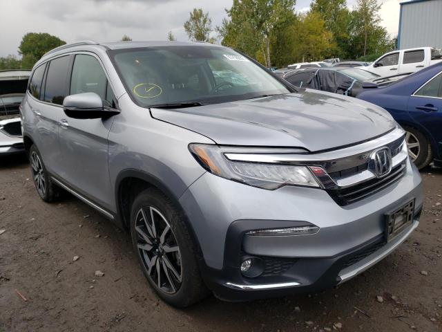 HONDA PILOT ELIT 2020 with VIN 5FNYF6H06LB030036 - Photo from auction