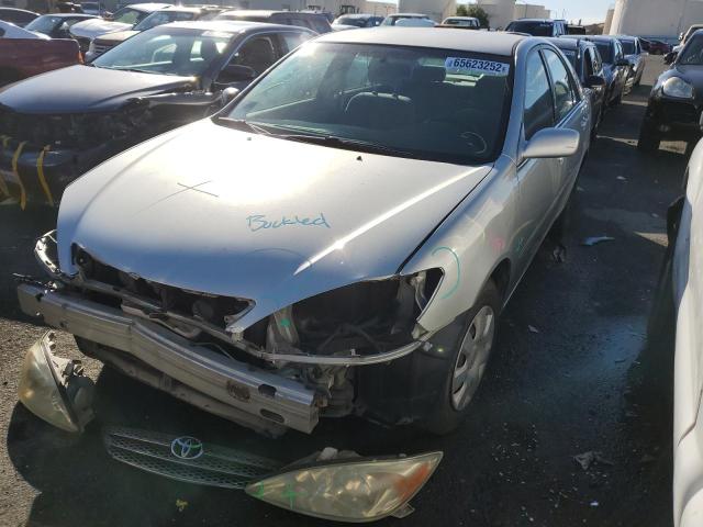 Photo 2 from auction – 2002 TOYOTA CAMRY LE with VIN JTDBE32K520135066