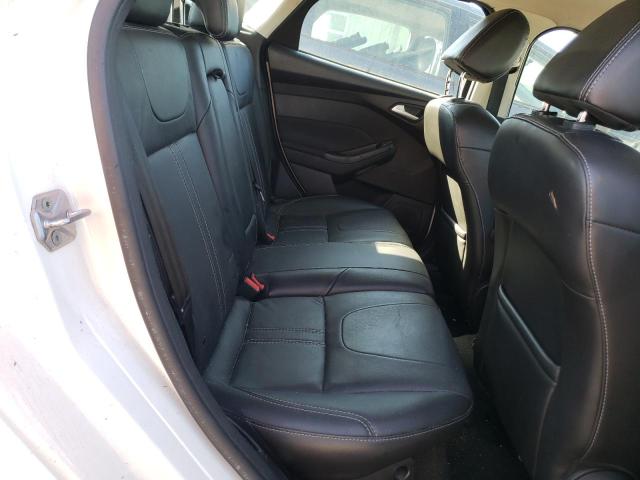 Photo 6 from auction – 2014 FORD FOCUS TITA with VIN 1FADP3N22EL220101