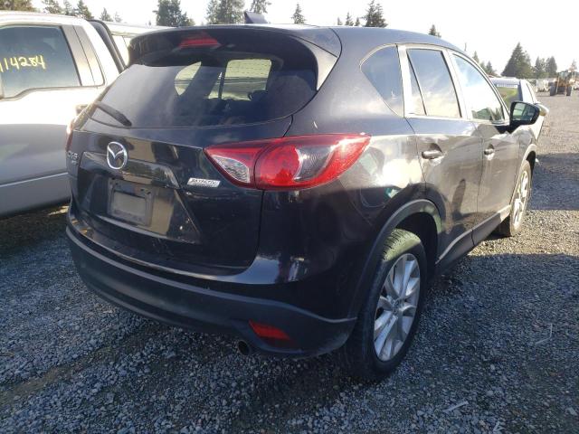 Photo 4 from auction – 2013 MAZDA CX-5 GT with VIN JM3KE4DE1D0153619