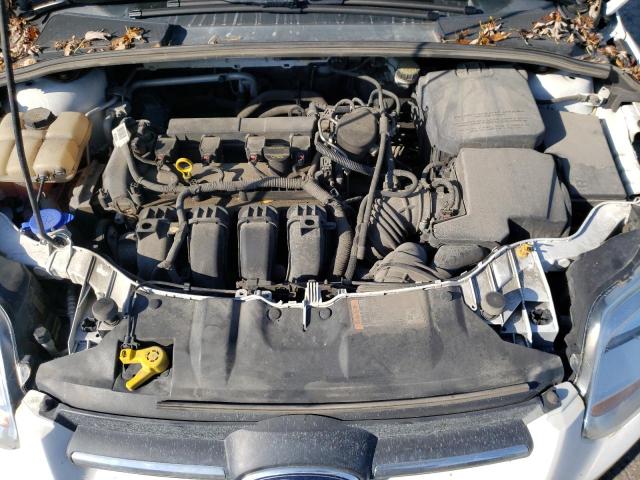 Photo 7 from auction – 2014 FORD FOCUS SE with VIN 1FADP3F23EL330024