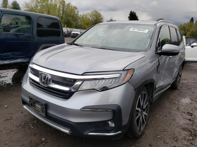 Photo 2 from auction – 2020 HONDA PILOT ELIT with VIN 5FNYF6H06LB030036