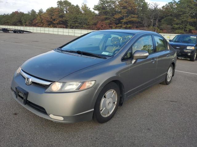 Photo 2 from auction – 2006 HONDA CIVIC HYBR with VIN JHMFA362X6S015330