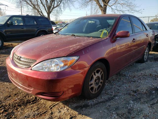 Photo 2 from auction – 2002 TOYOTA CAMRY LE with VIN JTDBE32K820068298