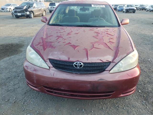 Photo 5 from auction – 2002 TOYOTA CAMRY LE with VIN JTDBE32KX20094966