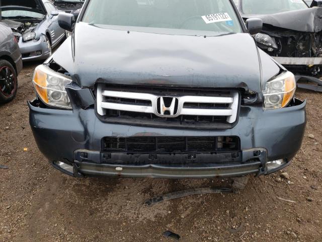 Photo 9 from auction – 2006 HONDA PILOT EX with VIN 5FNYF28456B020579