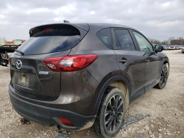 Photo 4 from auction – 2016 MAZDA CX-5 GT with VIN JM3KE4DY0G0824129