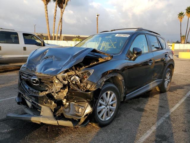 Photo 2 from auction – 2016 MAZDA CX-5 TOURI with VIN JM3KE4CYXG0692370