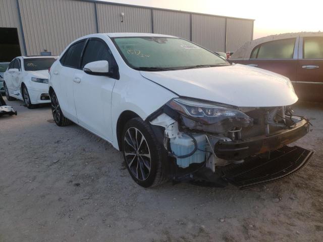 TOYOTA COROLLA L 2017 with VIN 5YFBURHEXHP642101 - Photo from auction