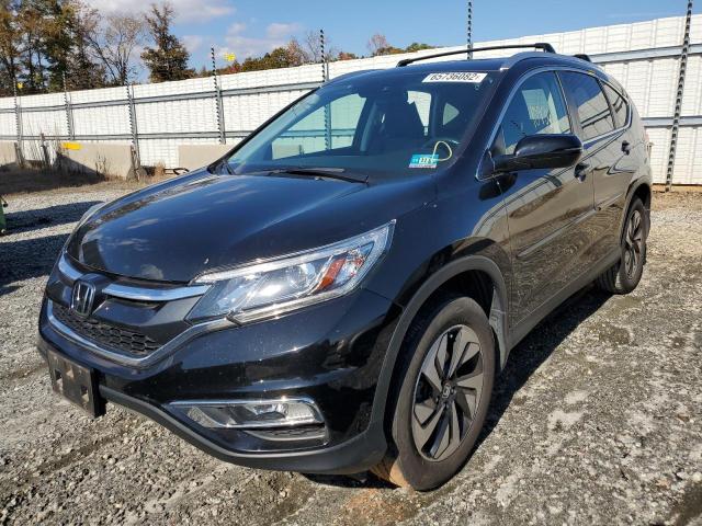 Photo 2 from auction – 2015 HONDA CR-V TOURI with VIN 5J6RM4H91FL130232