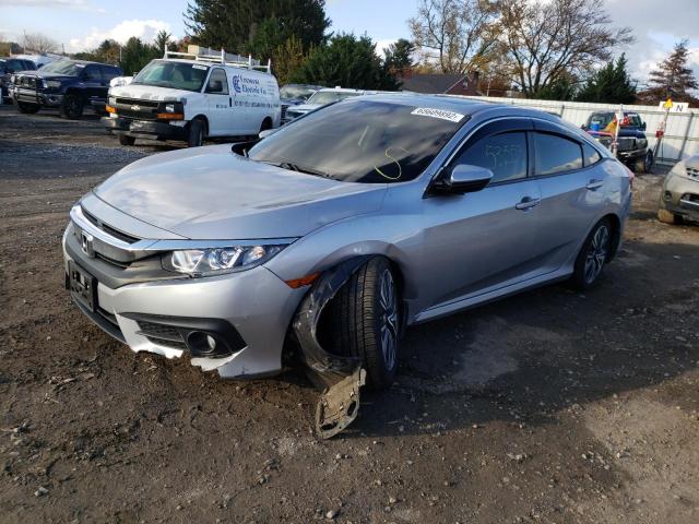 Photo 2 from auction – 2018 HONDA CIVIC EX with VIN JHMFC1F35JX021538