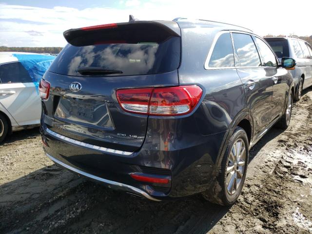 Photo 4 from auction – 2016 KIA SORENTO SX with VIN 5XYPK4A51GG102101