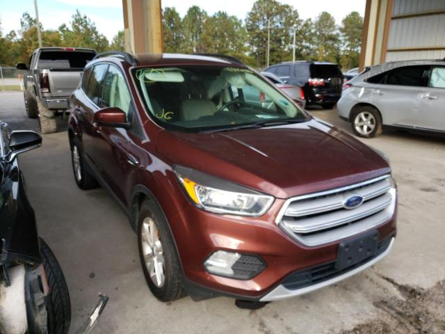 FORD ESCAPE SE 2018 with VIN 1FMCU0GD1JUC87395 - Photo from auction