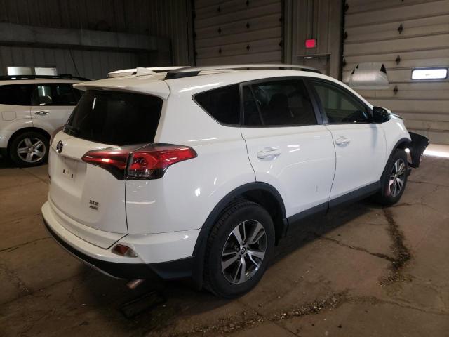 Photo 4 from auction – 2017 TOYOTA RAV4 XLE with VIN 2T3RFREV4HW555894