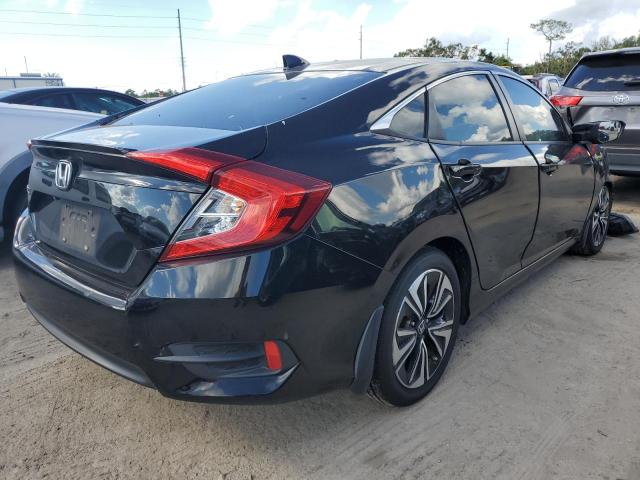 Photo 4 from auction – 2016 HONDA CIVIC EX with VIN 2HGFC1F30GH630472