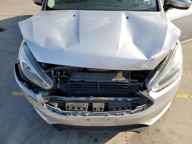 Photo 11 from auction – 2016 FORD FOCUS SE with VIN 1FADP3K23GL319596