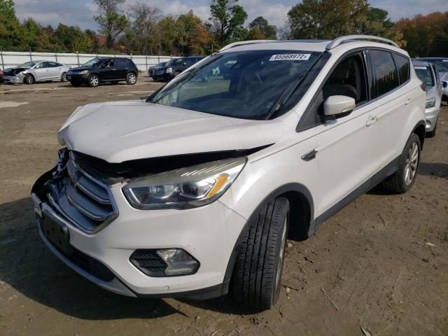 Photo 2 from auction – 2017 FORD ESCAPE TIT with VIN 1FMCU0JD8HUA10326