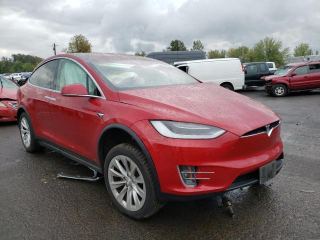 TESLA MODEL X 2017 with VIN 5YJXCAE24HF076579 - Photo from auction