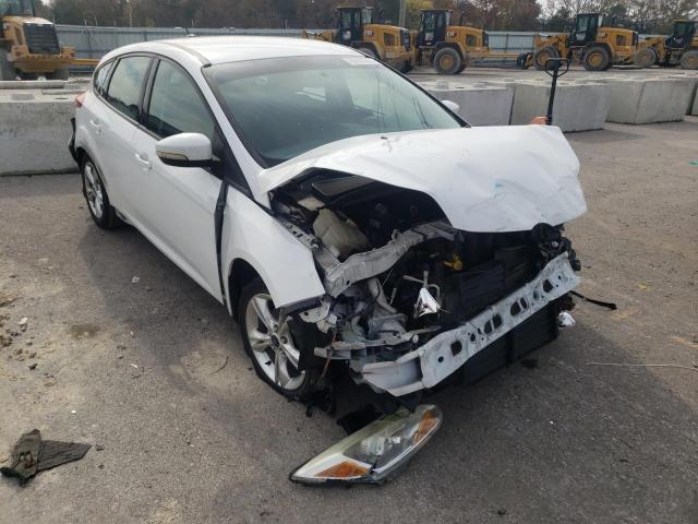 FORD FOCUS SE 2014 with VIN 1FADP3K20EL244000 - Photo from auction