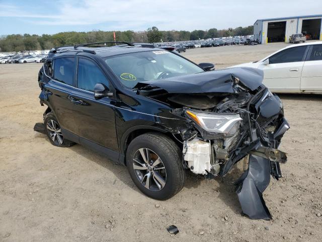 TOYOTA RAV4 XLE 2017 with VIN 2T3RFREV1HW648369 - Photo from auction