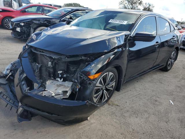 Photo 2 from auction – 2016 HONDA CIVIC EX with VIN 2HGFC1F30GH630472