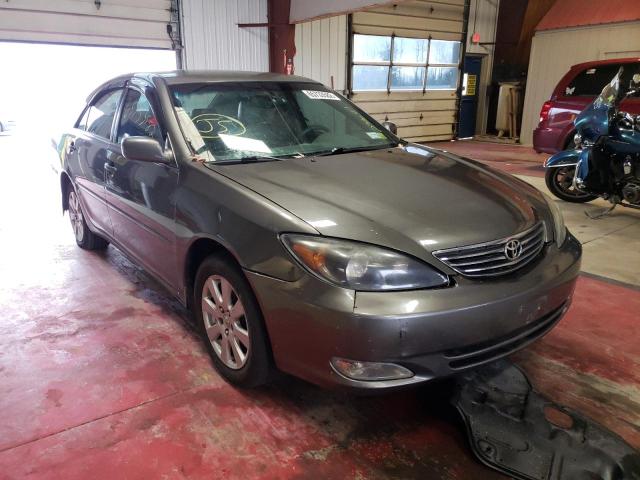 TOYOTA CAMRY LE 2004 with VIN 4T1BE32K14U809432 - Photo from auction