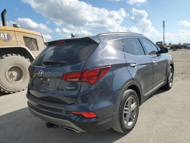 Photo 4 from auction – 2017 HYUNDAI SANTA FE S with VIN 5NMZU3LB8HH017179