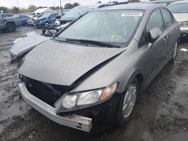 Photo 2 from auction – 2006 HONDA CIVIC HYBR with VIN JHMFA36206S006717