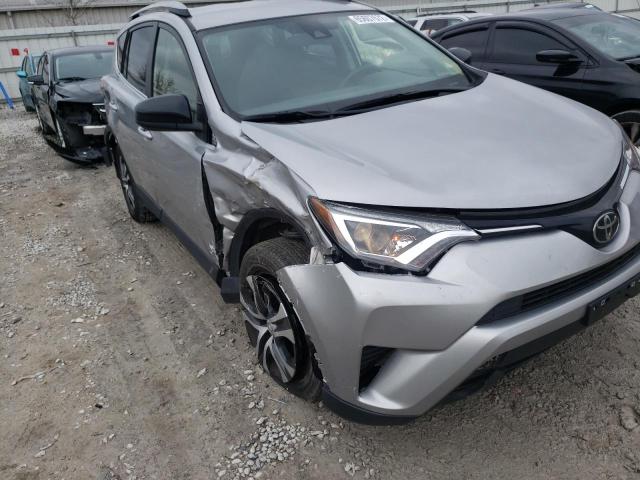 Photo 9 from auction – 2018 TOYOTA RAV4 LE with VIN JTMBFREV7JJ250427
