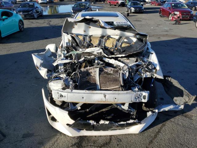 Photo 9 from auction – 2015 TOYOTA PRIUS C with VIN JTDKDTB31F1112041
