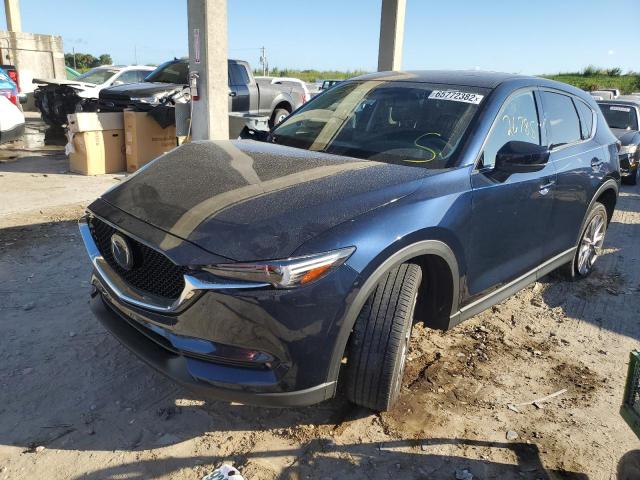 Photo 2 from auction – 2021 MAZDA CX-5 GRAND with VIN JM3KFBDM1M1488026