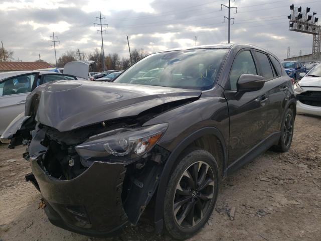 Photo 2 from auction – 2016 MAZDA CX-5 GT with VIN JM3KE4DY0G0824129