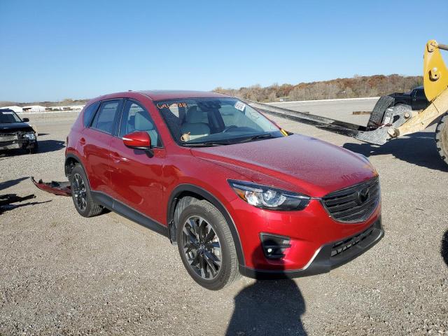 MAZDA CX-5 GT 2016 with VIN JM3KE2DYXG0696888 - Photo from auction