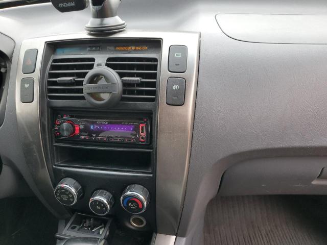 Photo 9 from auction – 2005 HYUNDAI TUCSON with VIN KM8JN72D85U129565