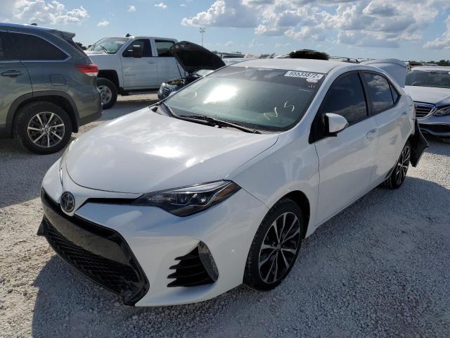 Photo 2 from auction – 2018 TOYOTA COROLLA L with VIN 5YFBURHE9JP810719