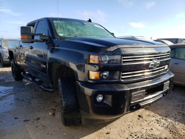 CHEVROLET SILVERADO 2019 with VIN 1GC1KSEG1KF256602 - Photo from auction