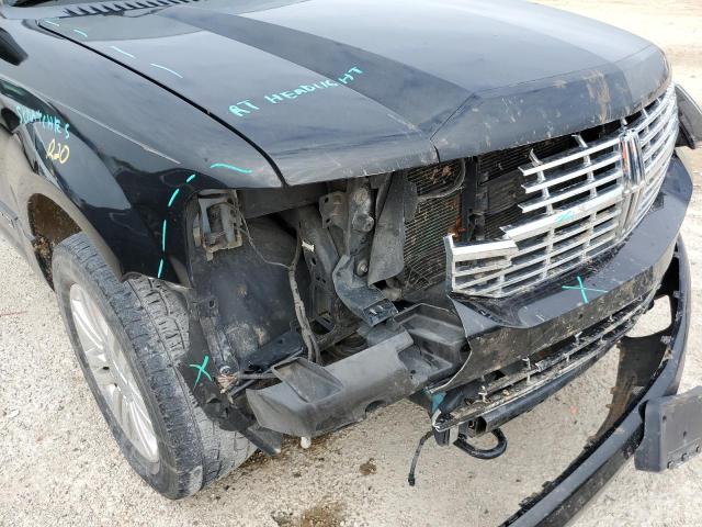 Photo 9 from auction – 2014 LINCOLN NAVIGATOR with VIN 5LMJJ3H57EEL08997